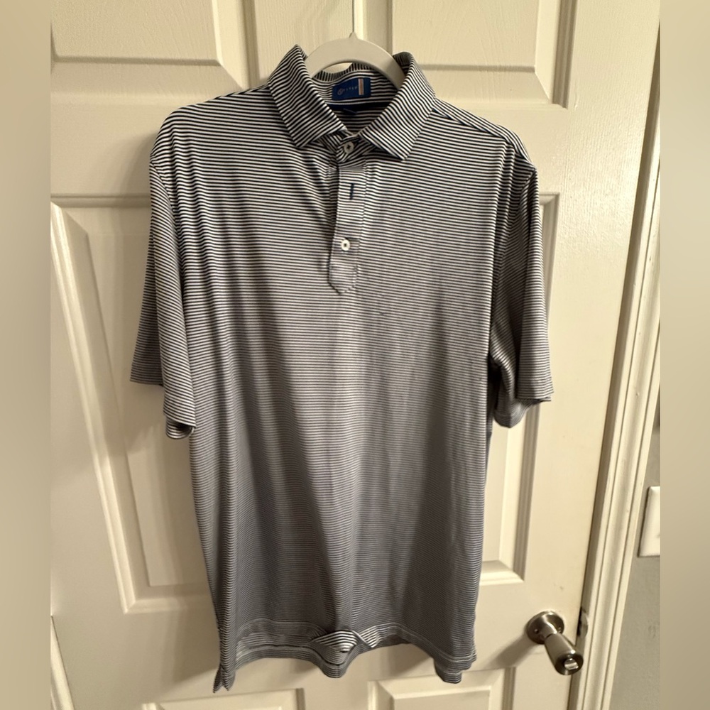 Stitch medium navy and white striped polo.